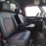 Id buzz interieur met zwart leder en rode stiksel , gordel , hemel , logo